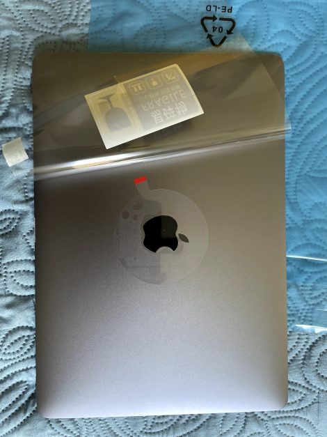 MacBook lid with damage for insurance claim report