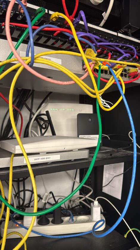 Network cabling and switch in a small business comms rack