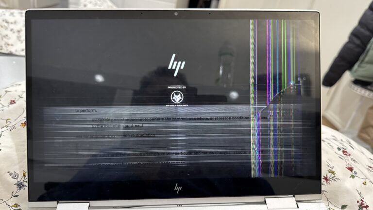 HP laptop screen with horizontal lines and colour fault
