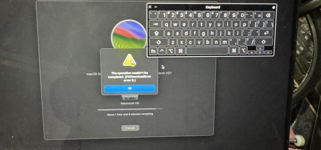 Mac showing macOS installation in progress Mac showing macOS installation in progress