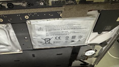 Laptop battery inside the chassis during battery replacement