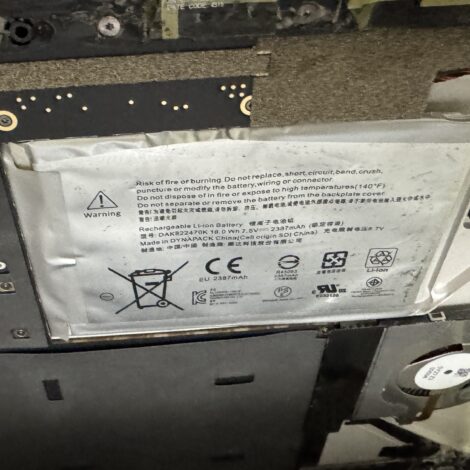 Laptop battery inside the chassis during battery replacement