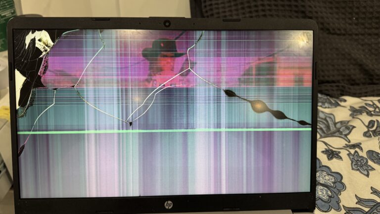 HP laptop with cracked, smashed screen